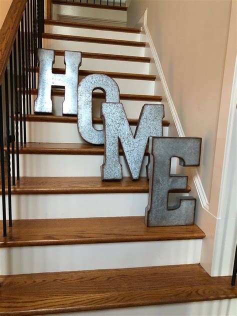 house wall decor with metal letters|large metal letters for outside.